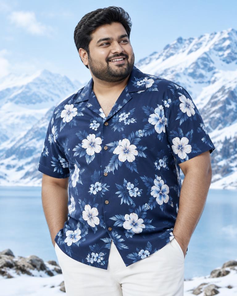 Model wearing an illustrative casual printed style in a plus size